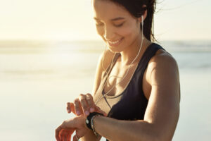 Cropped shot of an attractive and athletic young woman working out on the beach